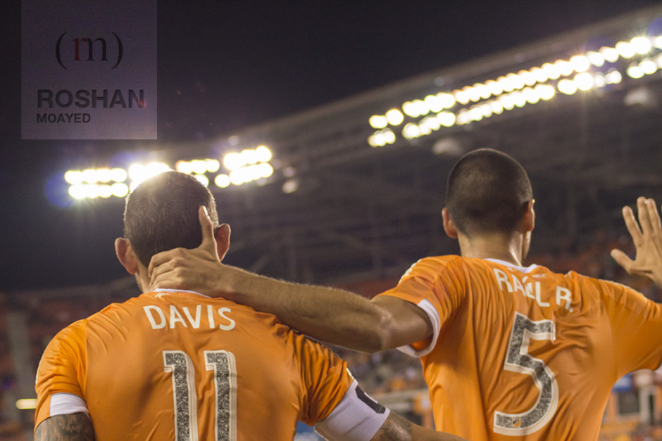 Raul Rodriguez celebrating his goal with brad Davis who assisted